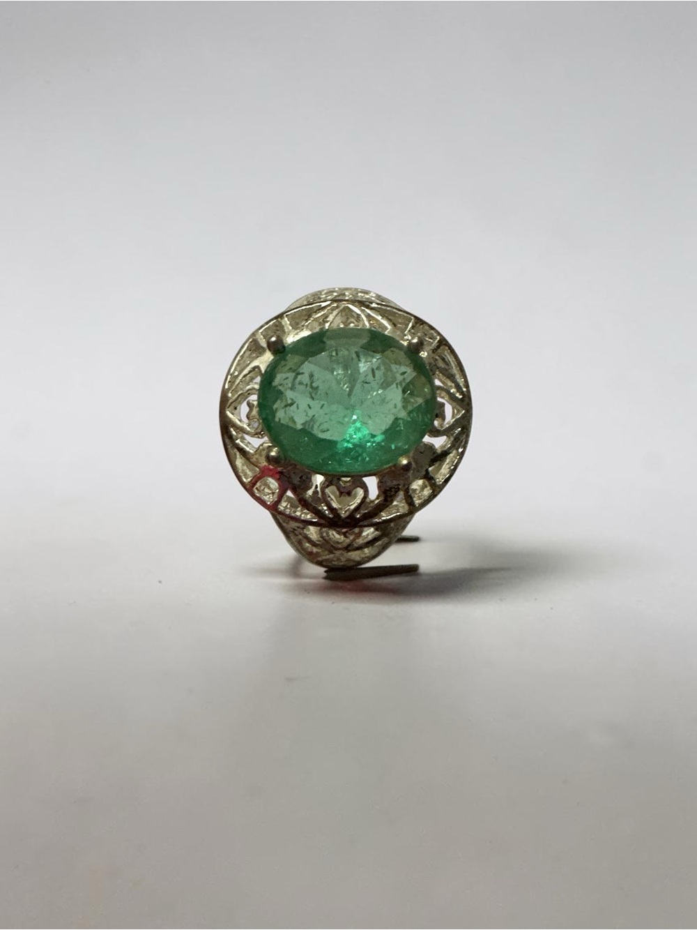 Elegant Silver-Tone Ring with Green Gemstone